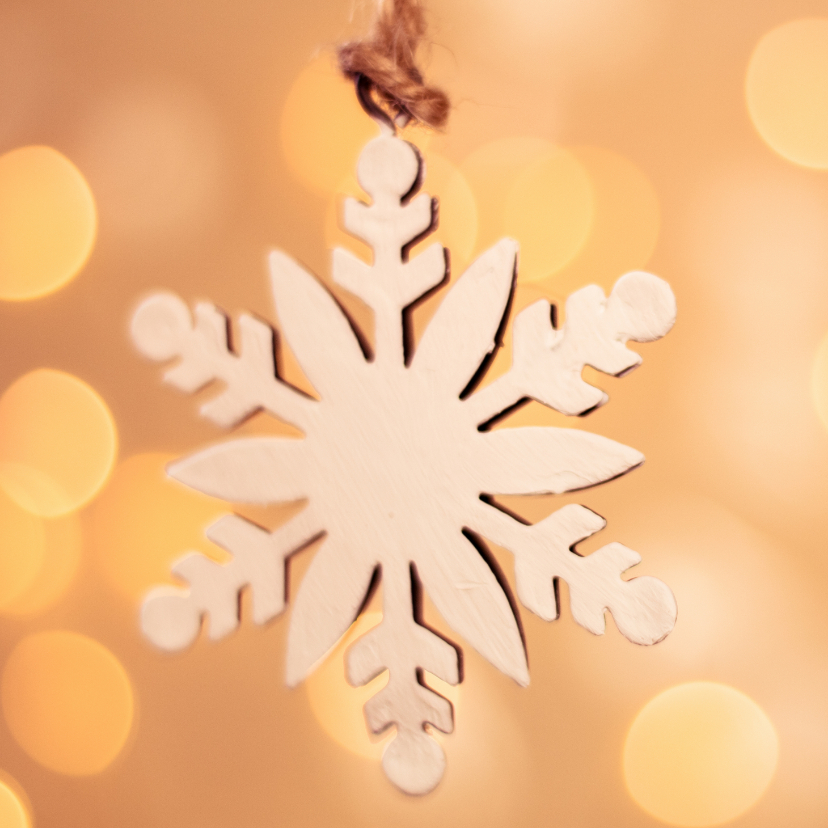 Kerstkaarten - Kerstkaart met een sneeuwvlok en achtergrondverlichting